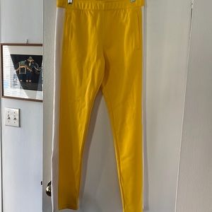 Tory Sport Yellow with White stripe on the side